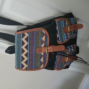 Vegan Bicho backpack with snap and drawstring closure